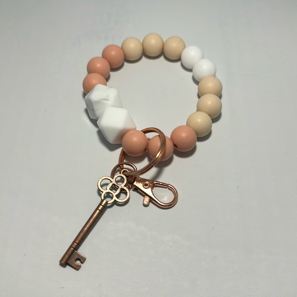 Silicone bead elastic wristlet keychain
skeleton key charm
rose gold keyring